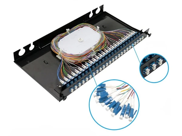 Rack-mounted ODF with slide-out splice trays showing fusion-spliced pigtails and fiber routing channels Rack-mounted ODF with slide-out splice trays showing fusion-spliced pigtails and fiber routing channels